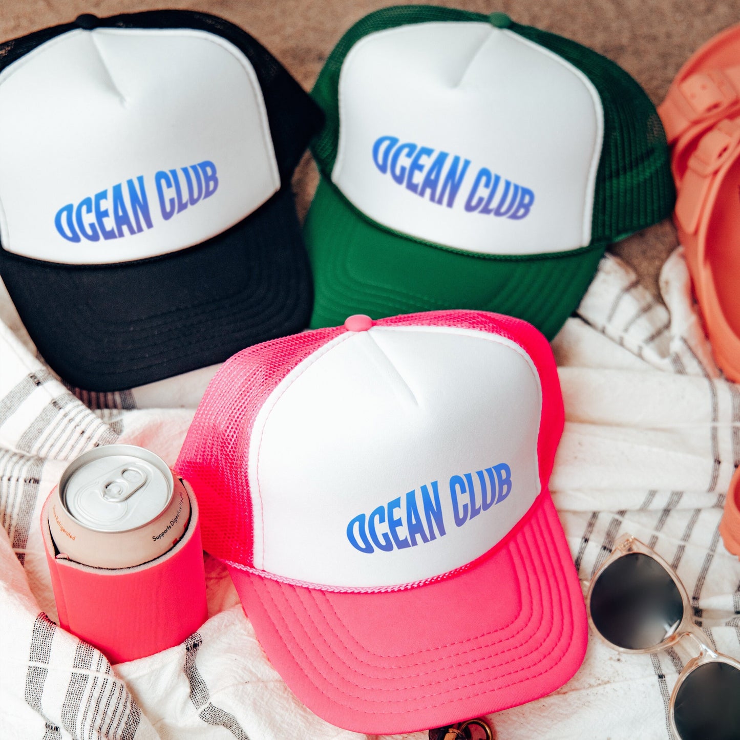 a group of hats sitting on top of a blanket