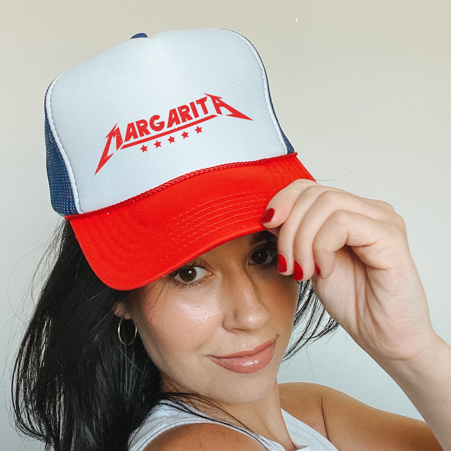a woman wearing a red, white and blue hat