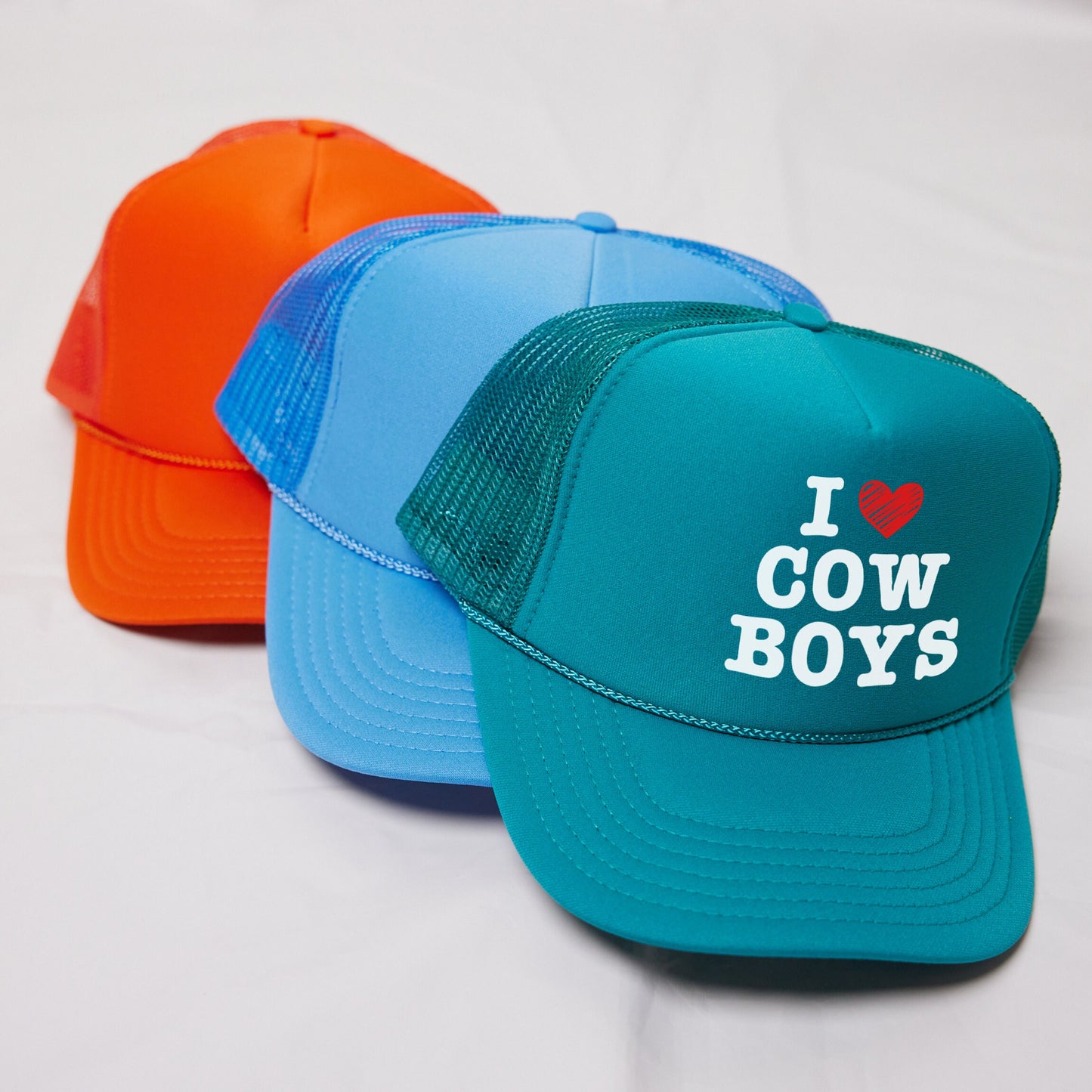 a couple of hats that are on a table