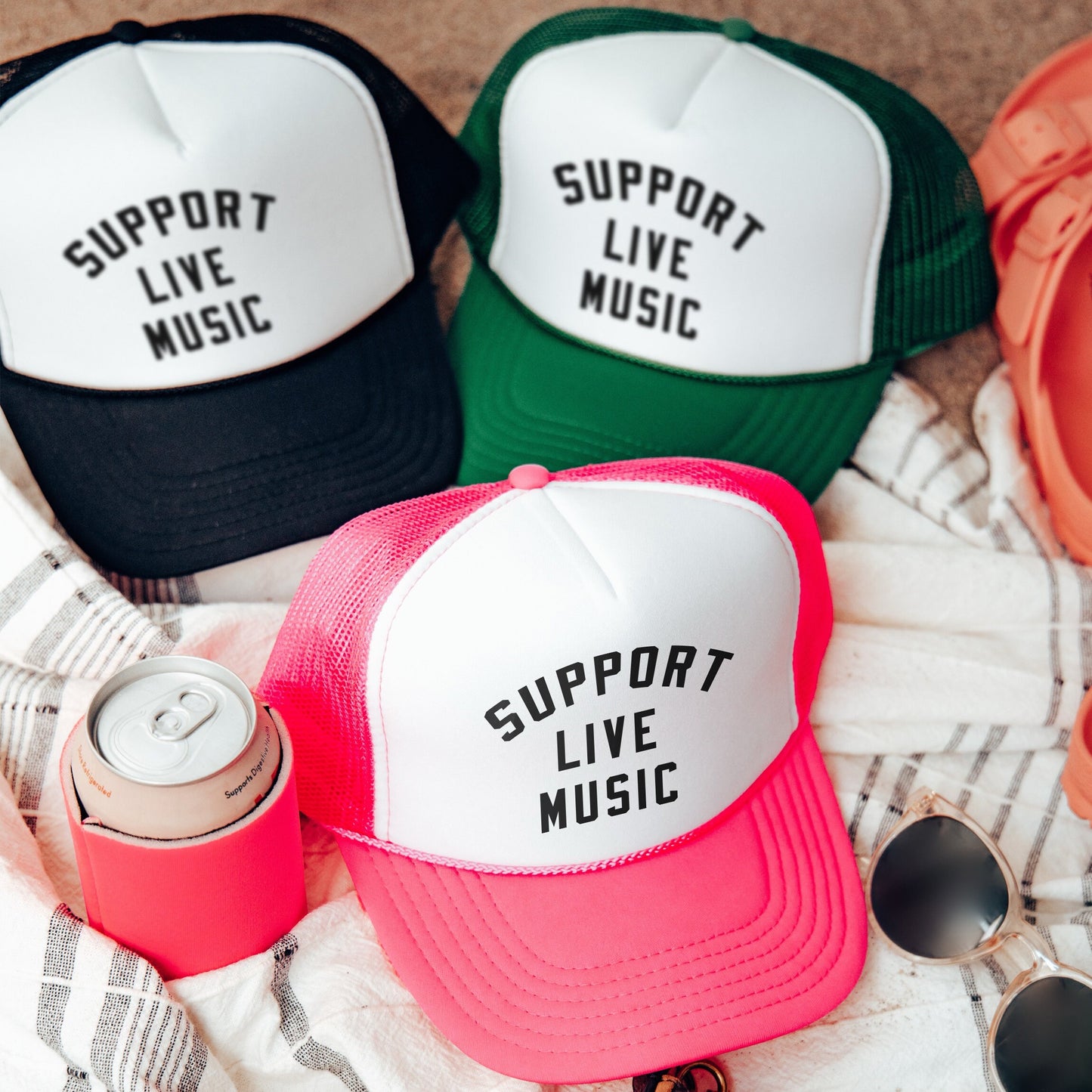 a group of hats sitting on top of a blanket