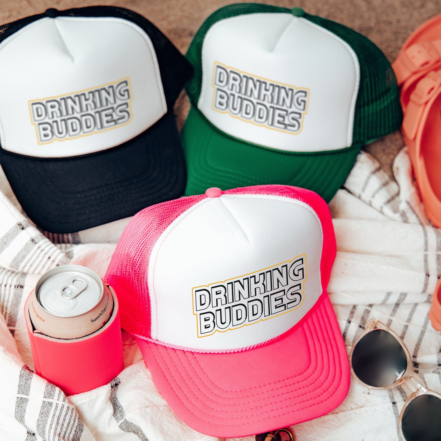 a group of hats sitting on top of a blanket