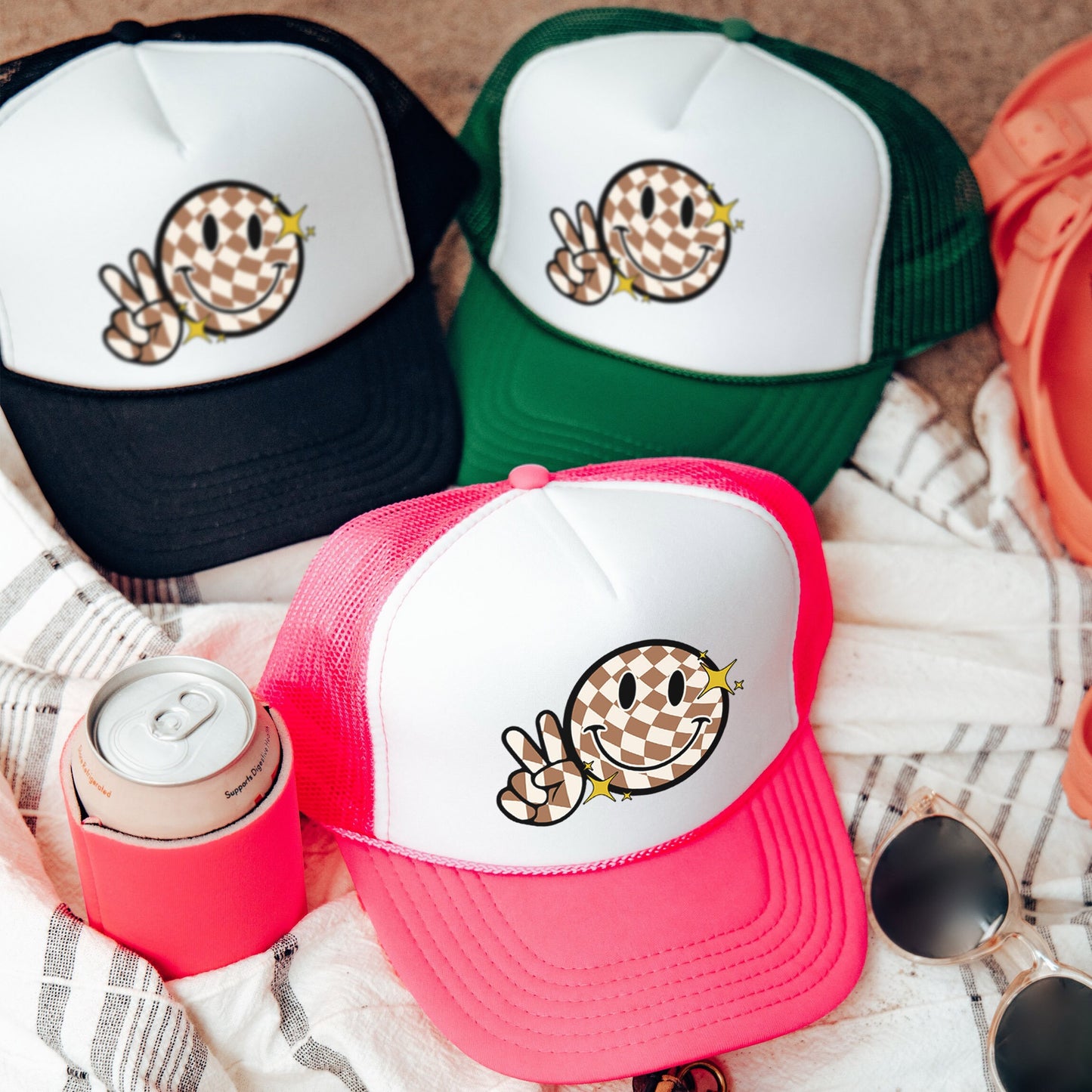 a group of hats sitting on top of a blanket