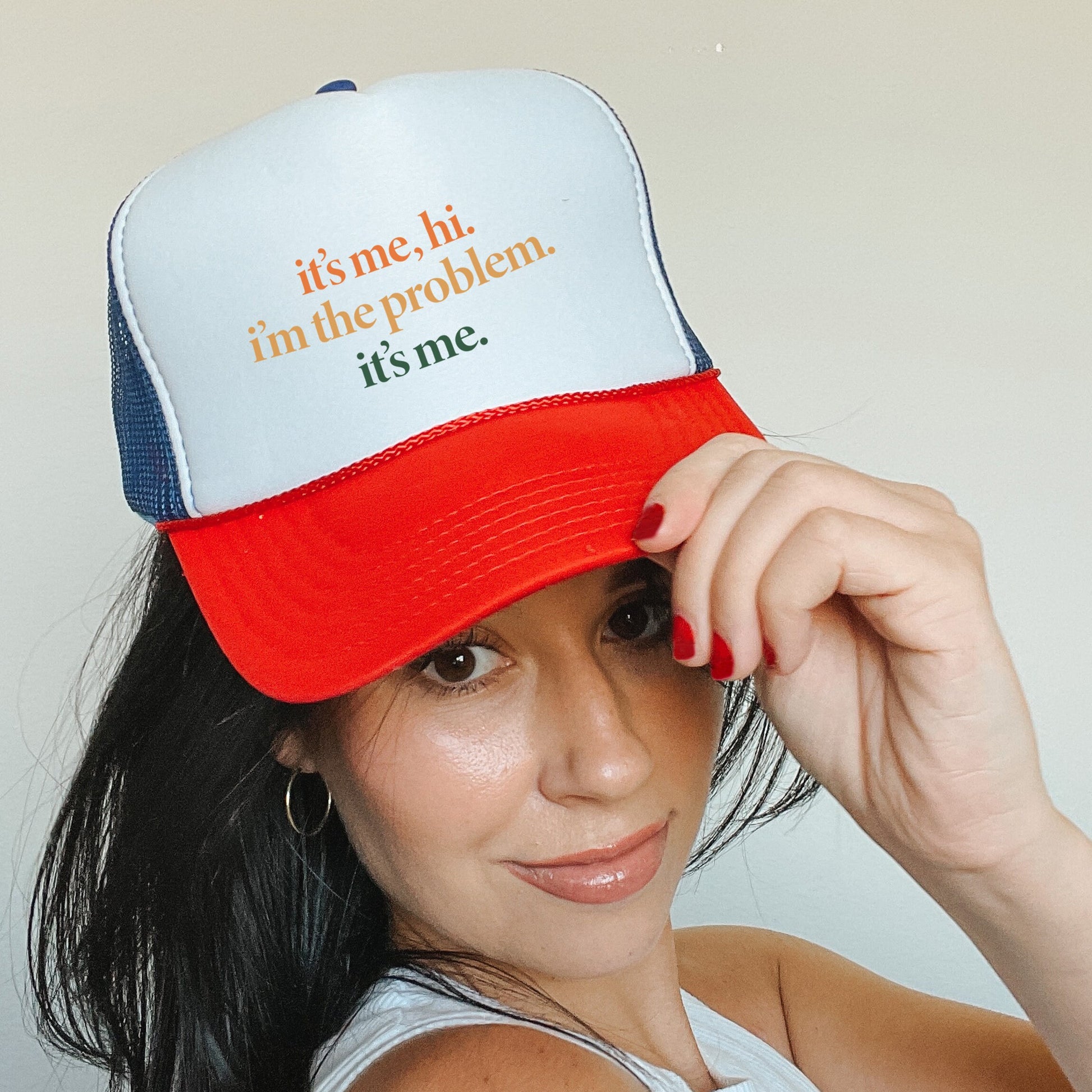 a woman wearing a red, white, and blue hat