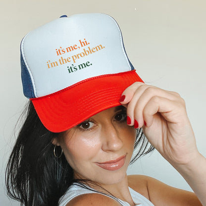 a woman wearing a red, white, and blue hat