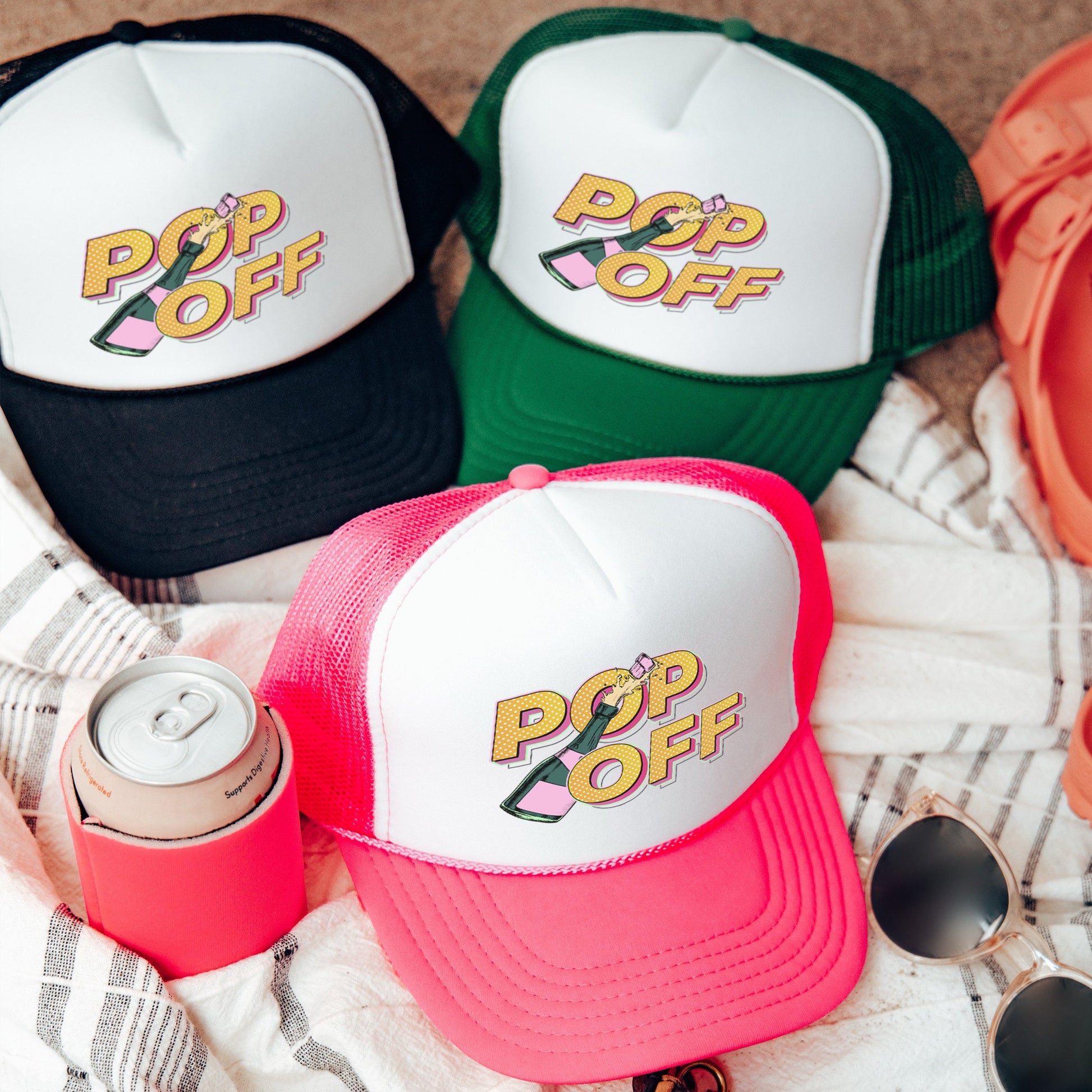 a group of hats sitting on top of a blanket