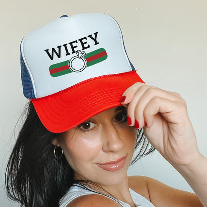 a woman wearing a red, white, and blue hat