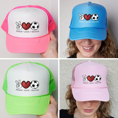 four different hats with a woman holding a soccer ball
