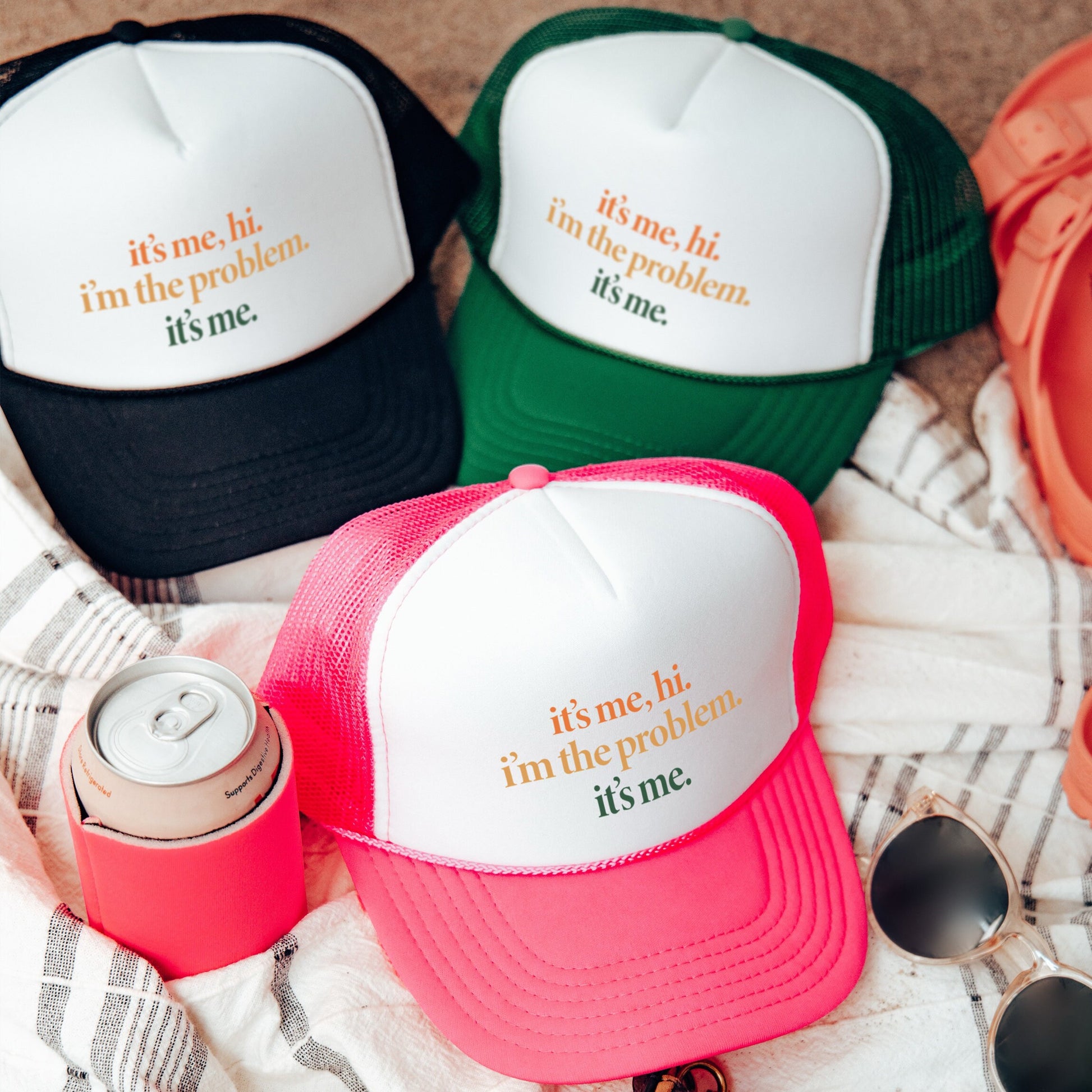 a group of hats sitting on top of a blanket