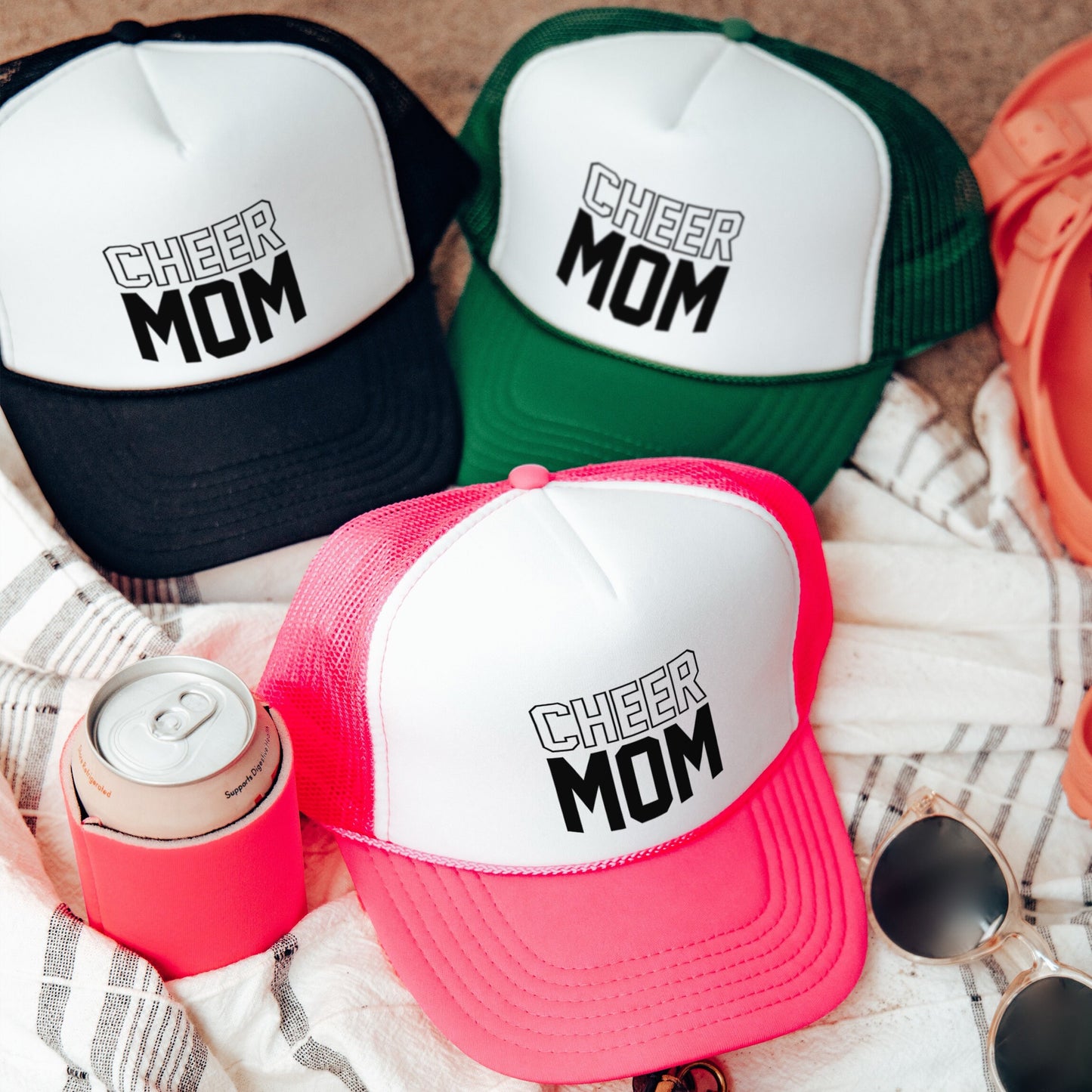 a group of hats sitting on top of a blanket