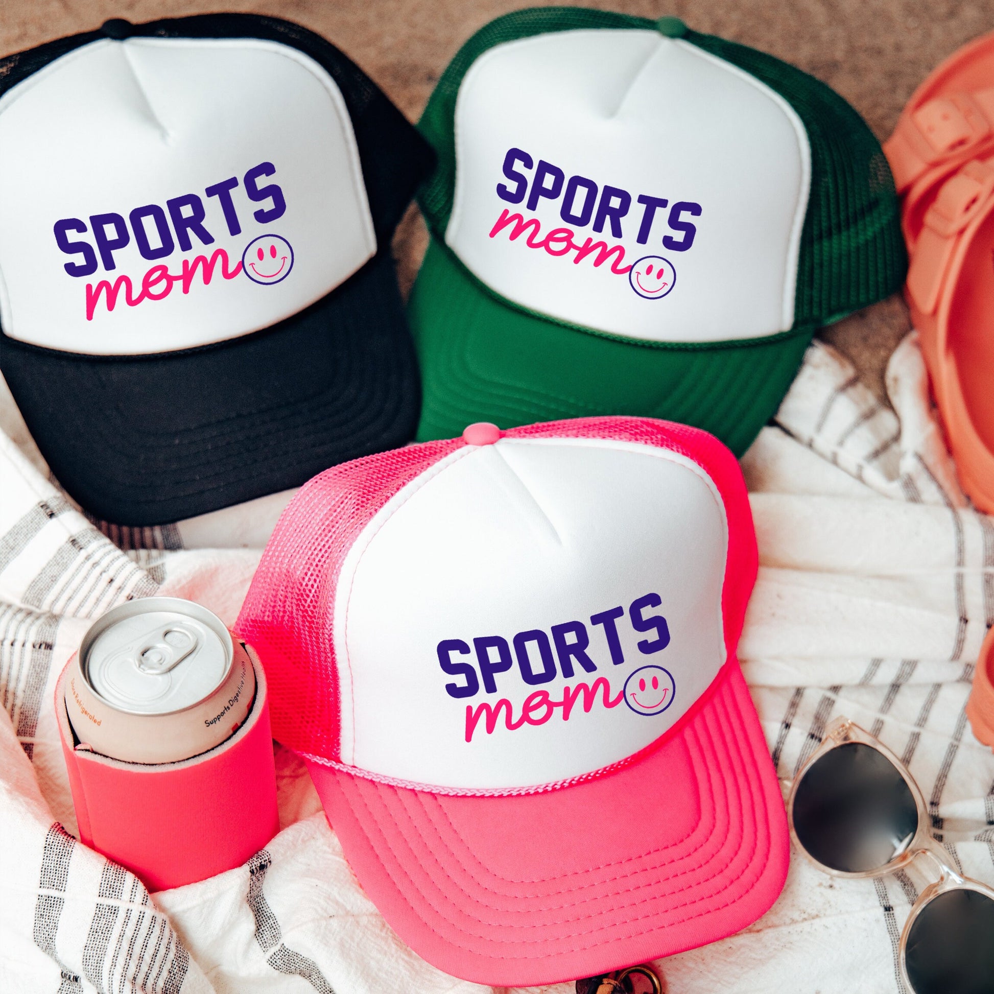 a group of hats sitting on top of a blanket