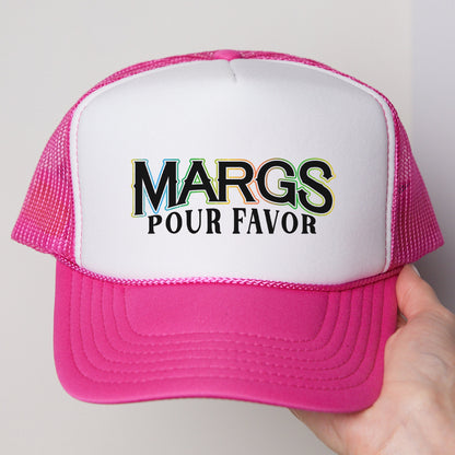 a person holding a pink and white trucker hat