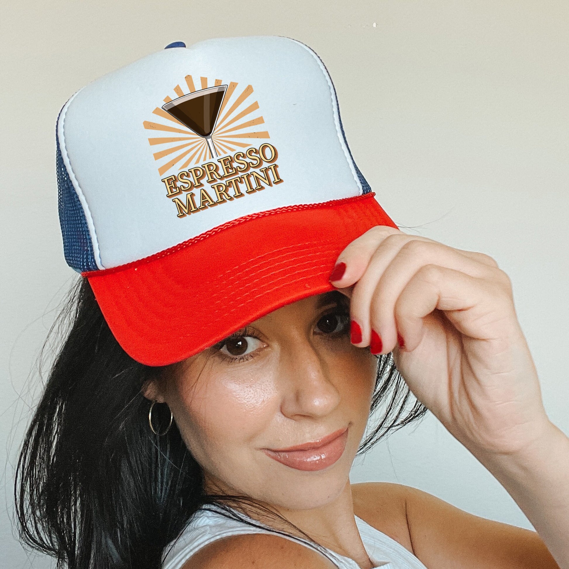 a woman wearing a red, white and blue hat