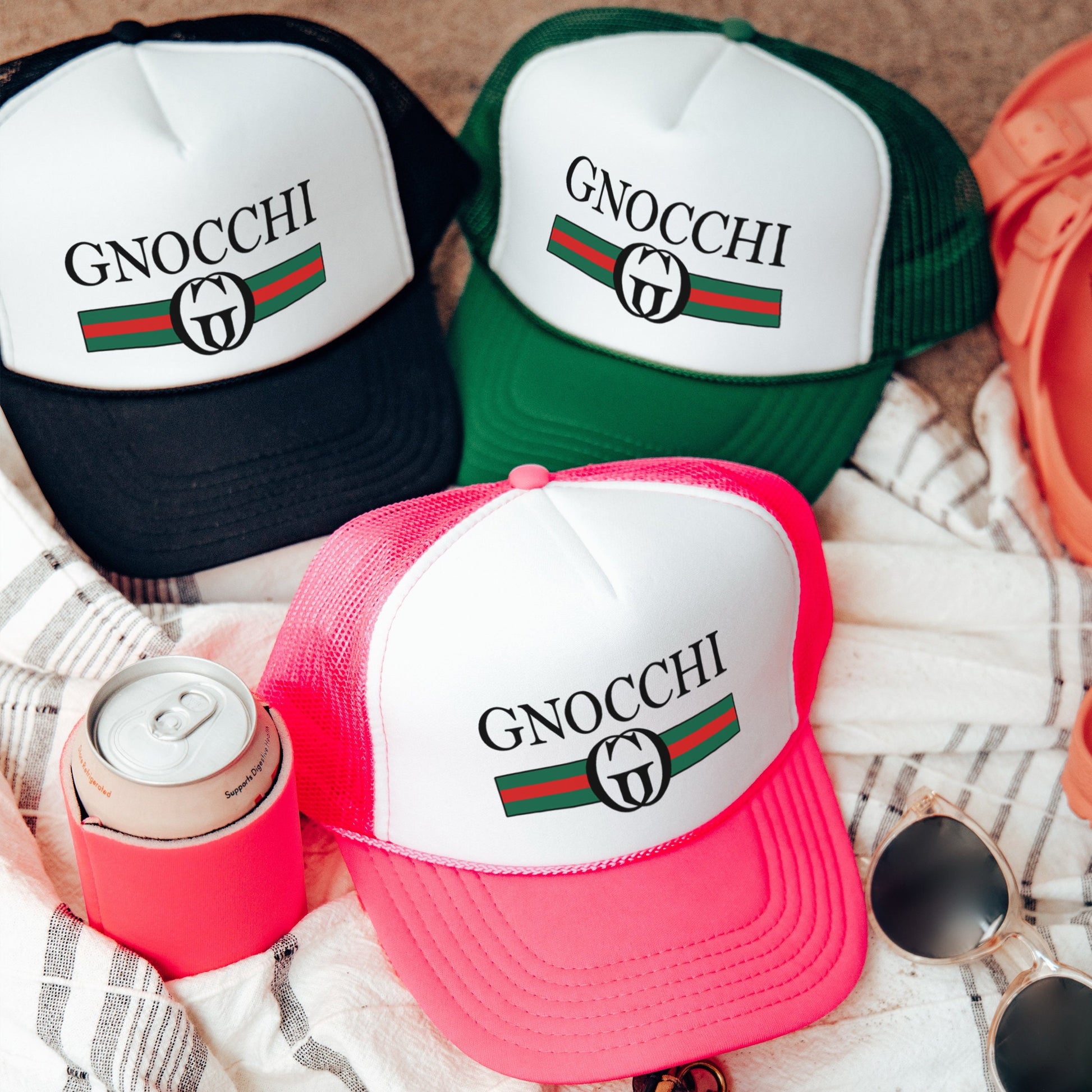 a group of hats sitting on top of a blanket