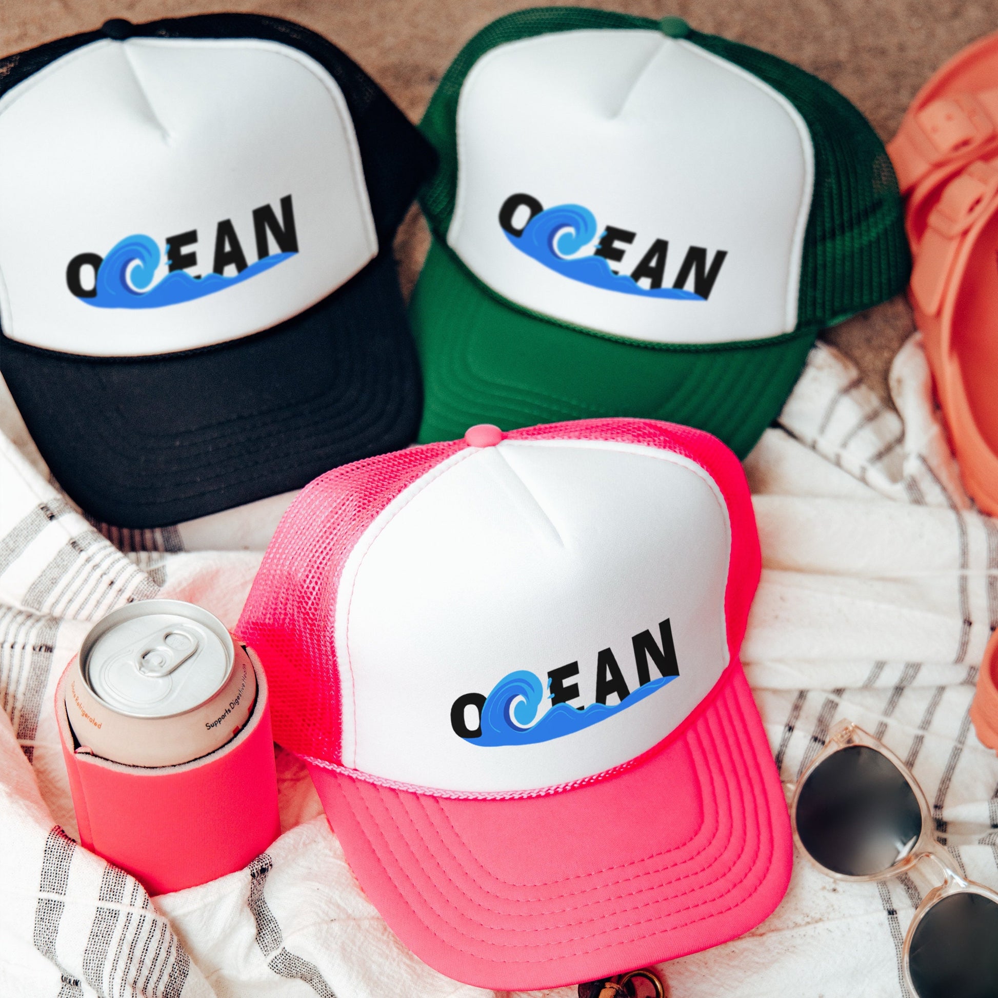 a group of hats sitting on top of a blanket