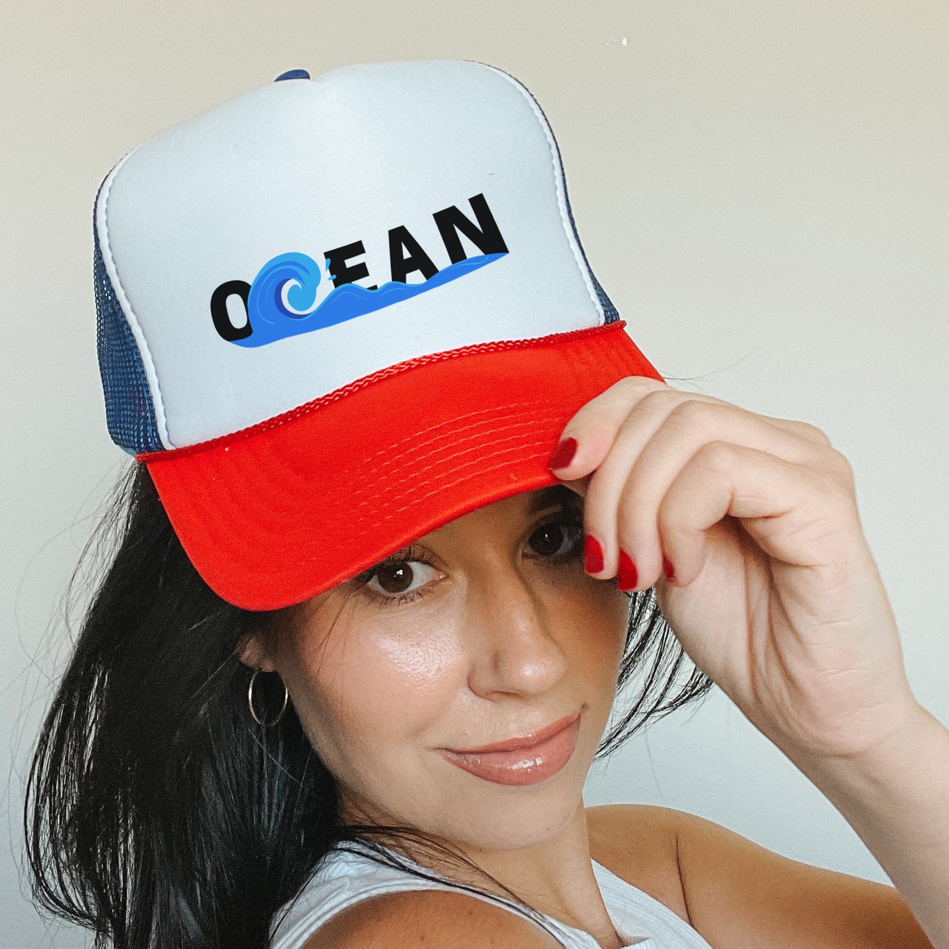 a woman wearing a red, white and blue hat