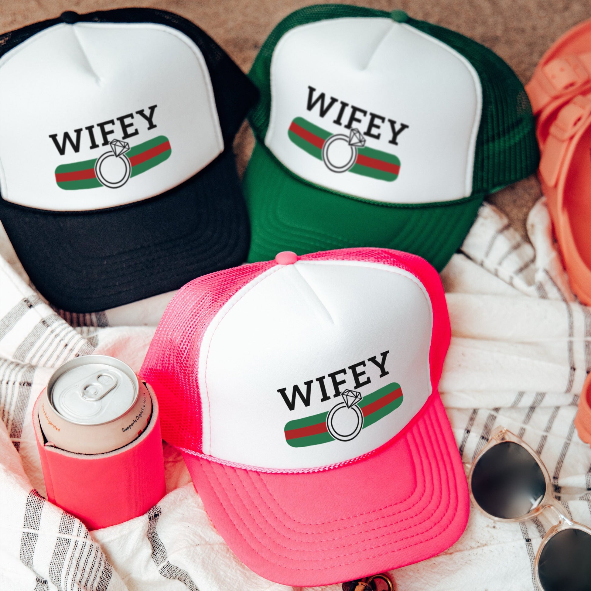 a group of hats sitting on top of a blanket