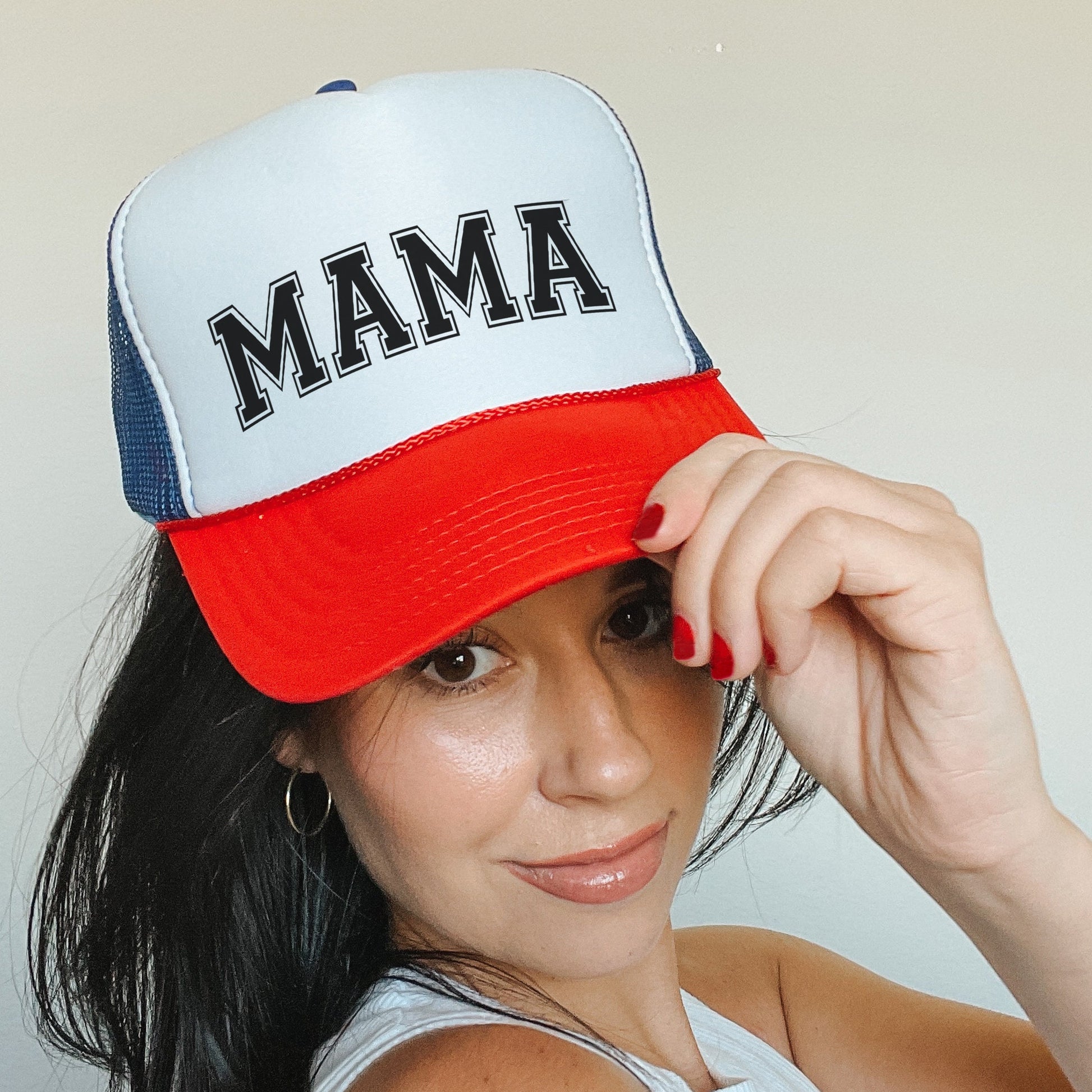a woman wearing a red, white and blue hat