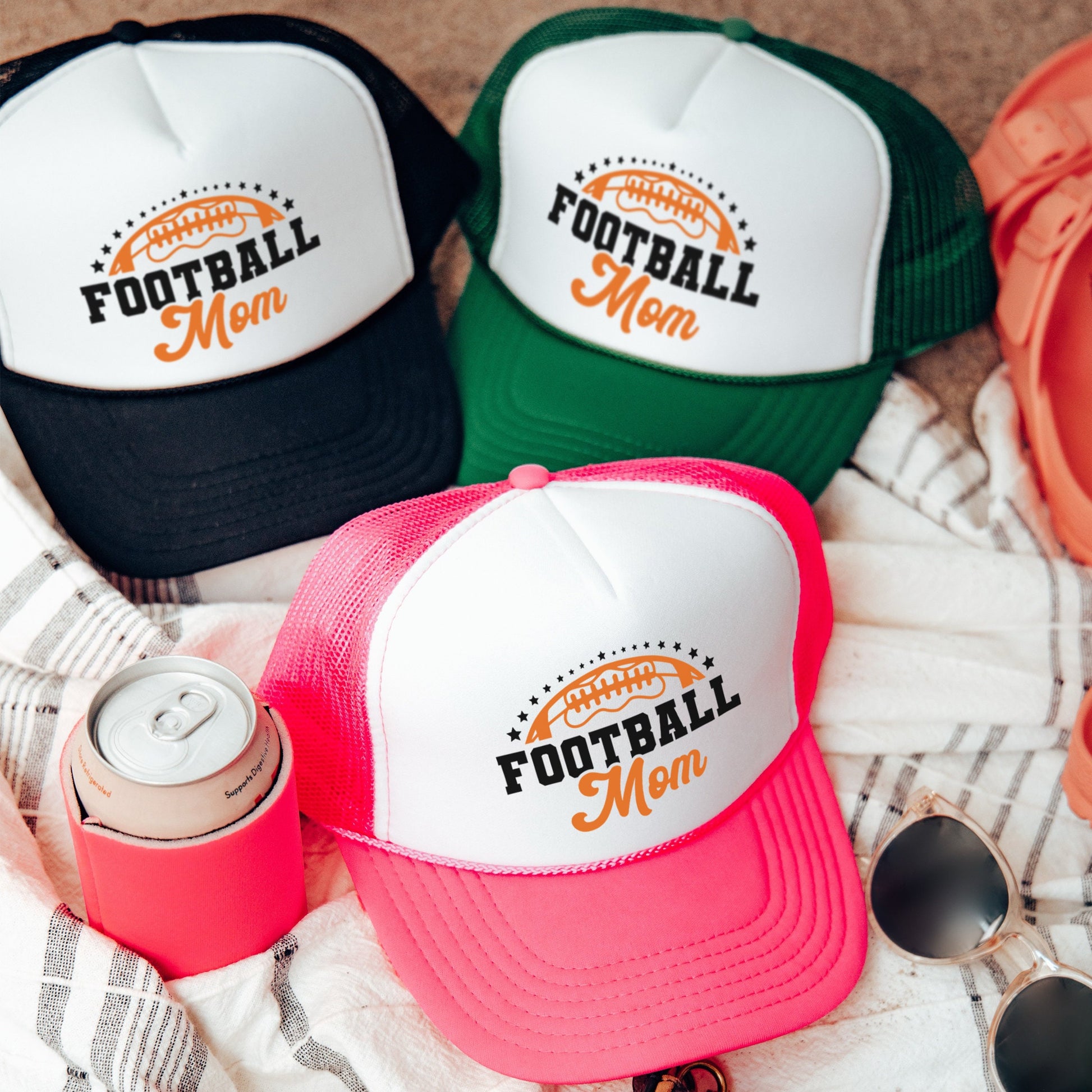a group of hats sitting on top of a blanket