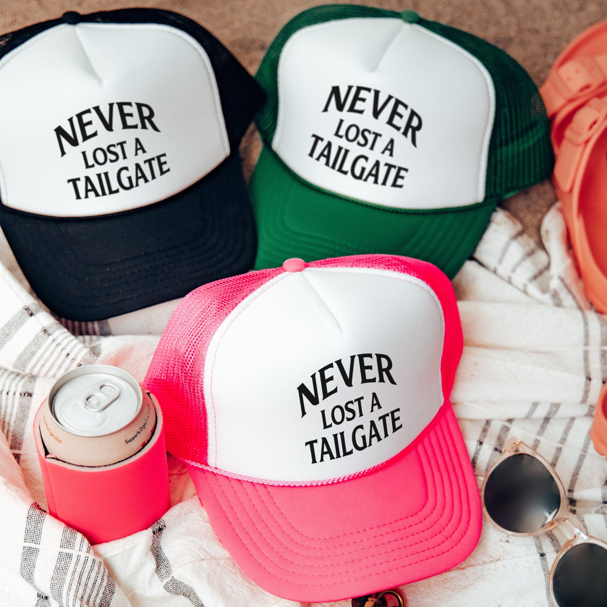 three hats that say never lost a tailgate