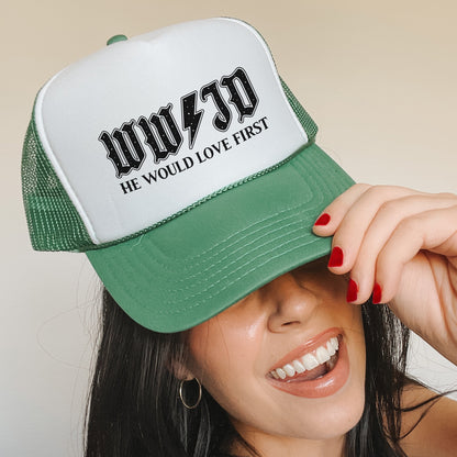 a woman wearing a green and white trucker hat