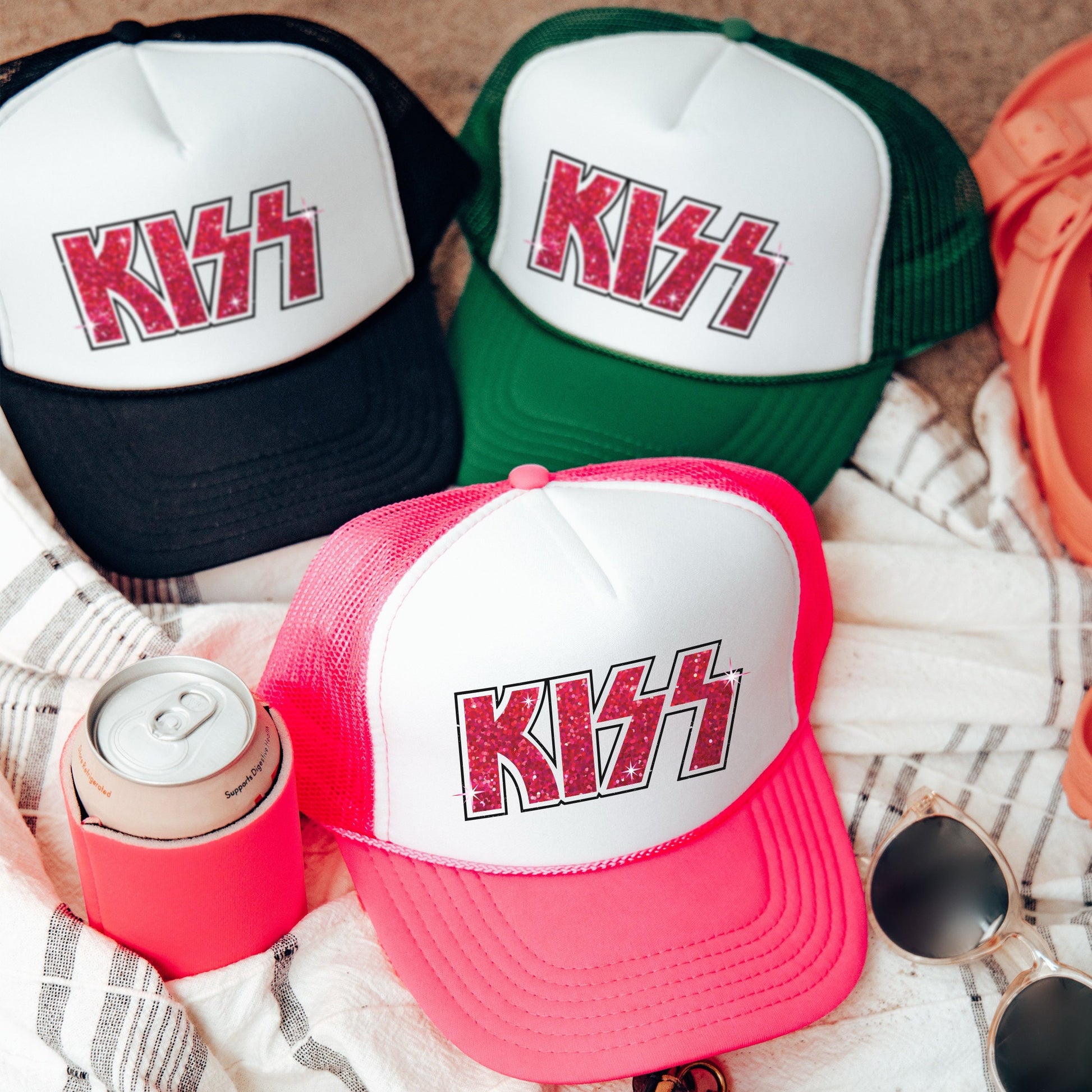 a group of hats sitting on top of a blanket