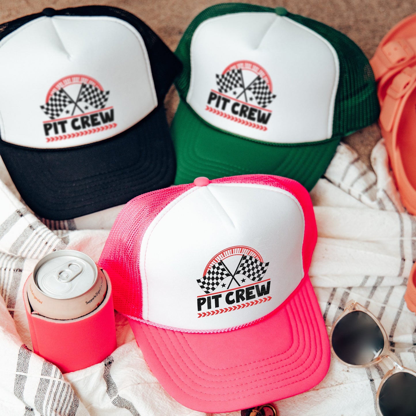 a group of hats sitting on top of a blanket