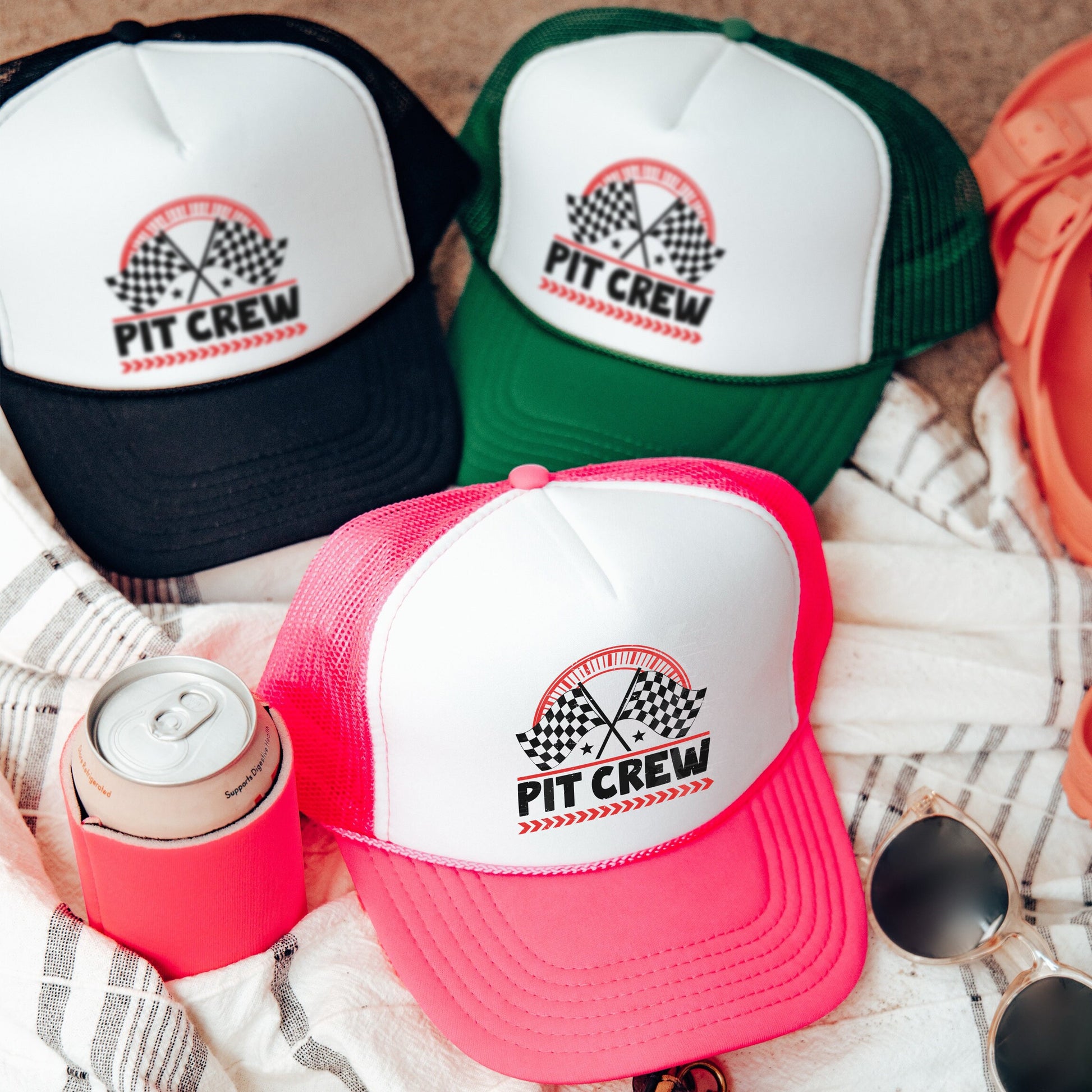 a group of hats sitting on top of a blanket