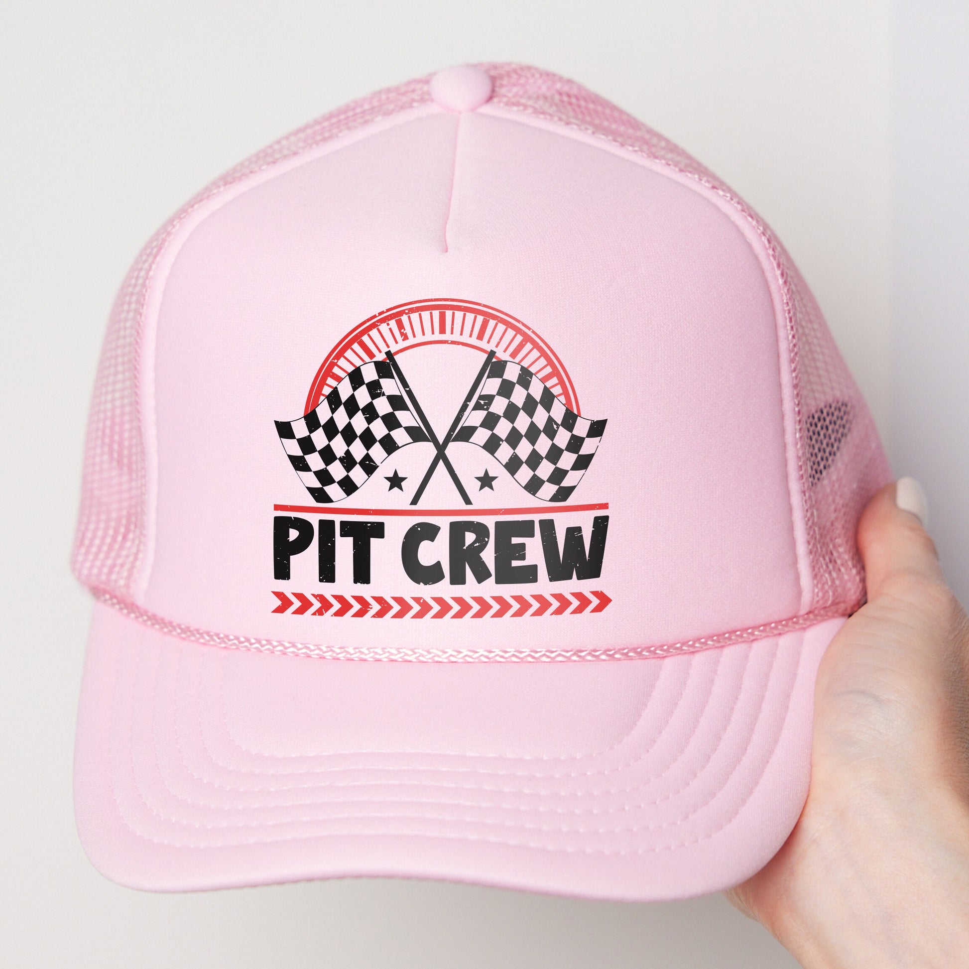 a pink hat with a checkered flag on it