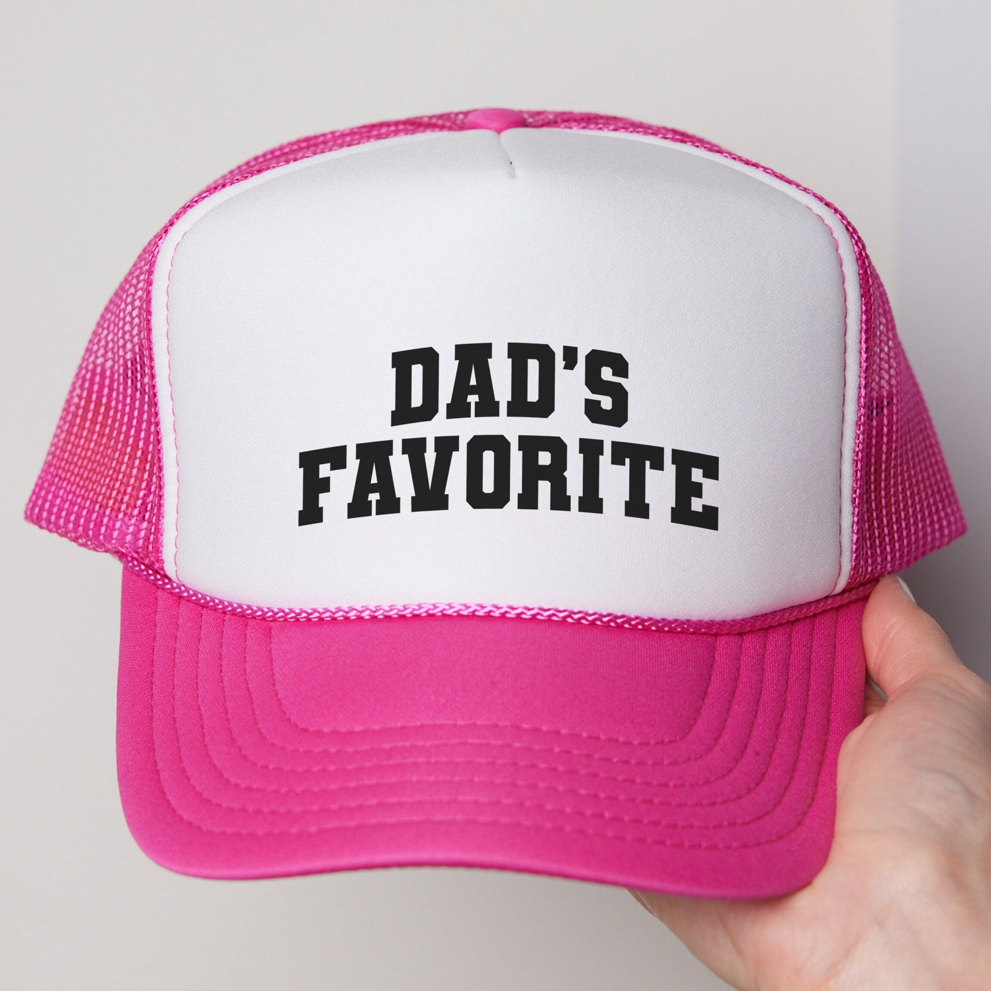 a pink and white hat that says dad&#39;s favorite