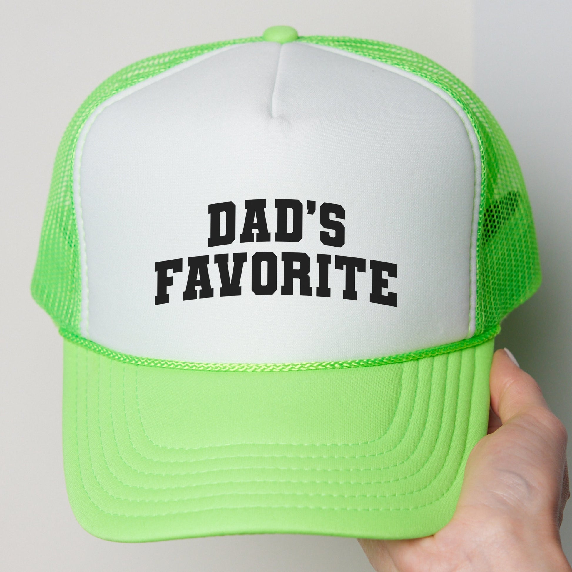 a green and white hat with the words dad&#39;s favorite on it