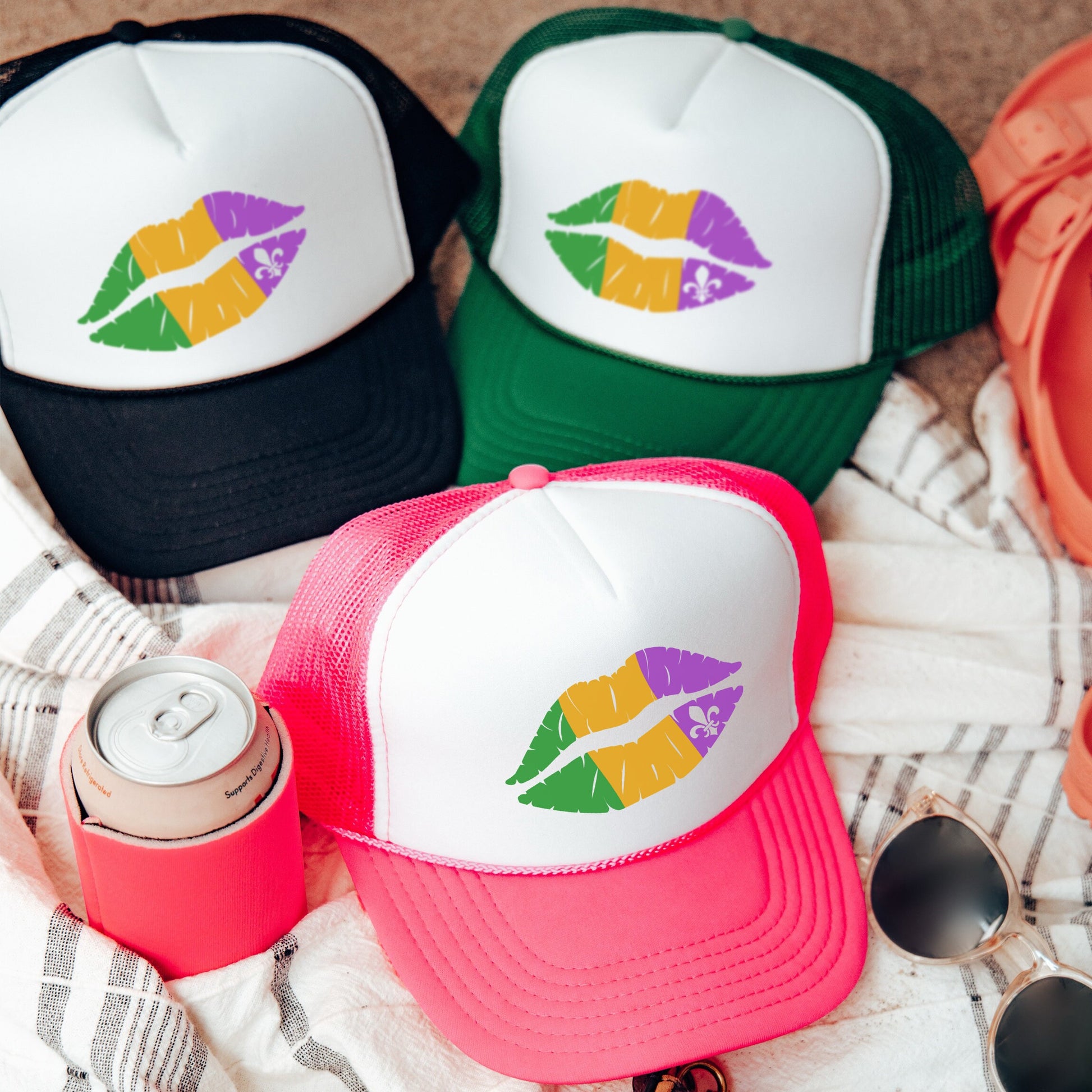 a group of hats sitting on top of a blanket