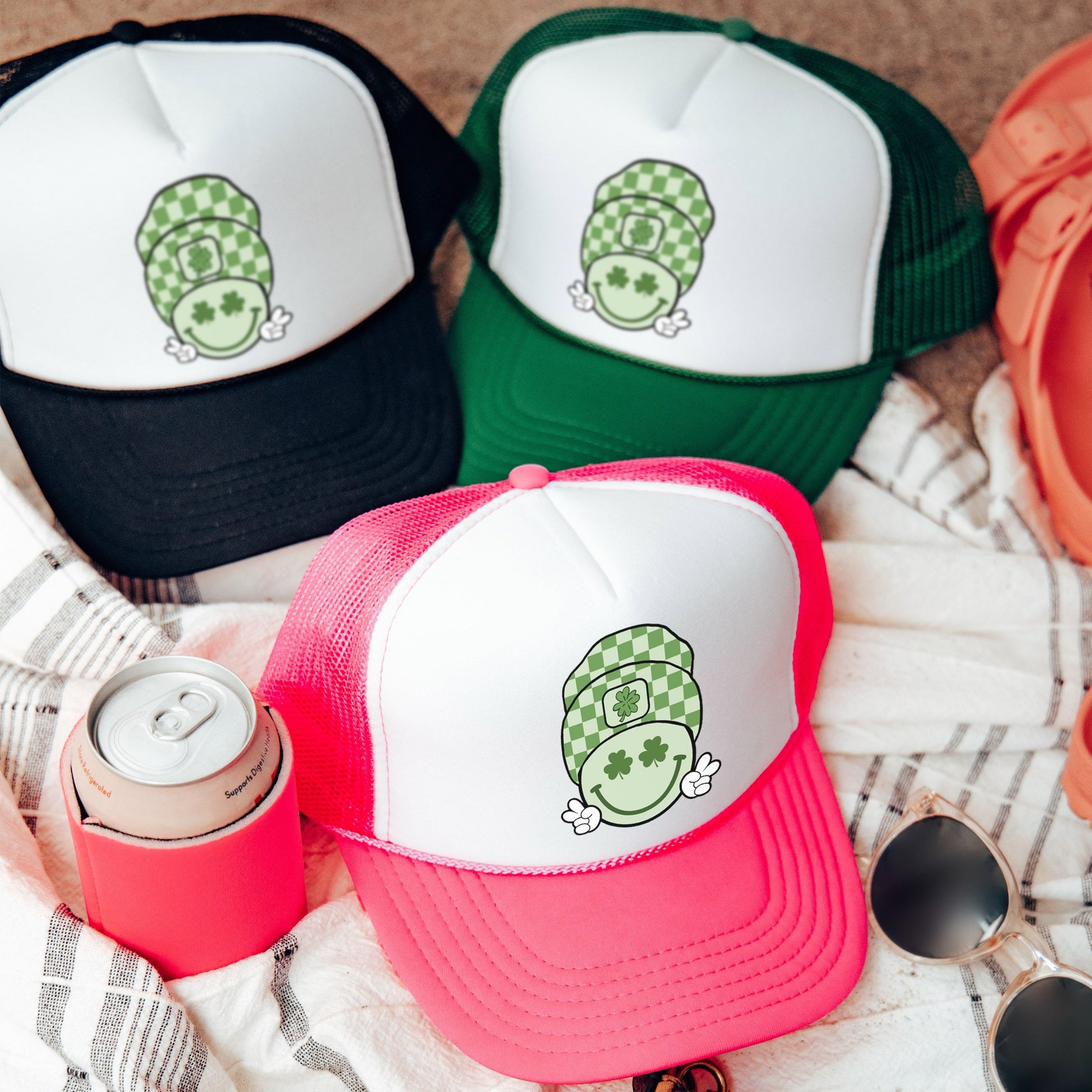 a group of hats sitting on top of a blanket