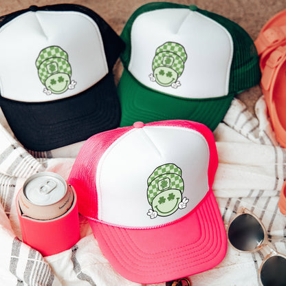 a group of hats sitting on top of a blanket