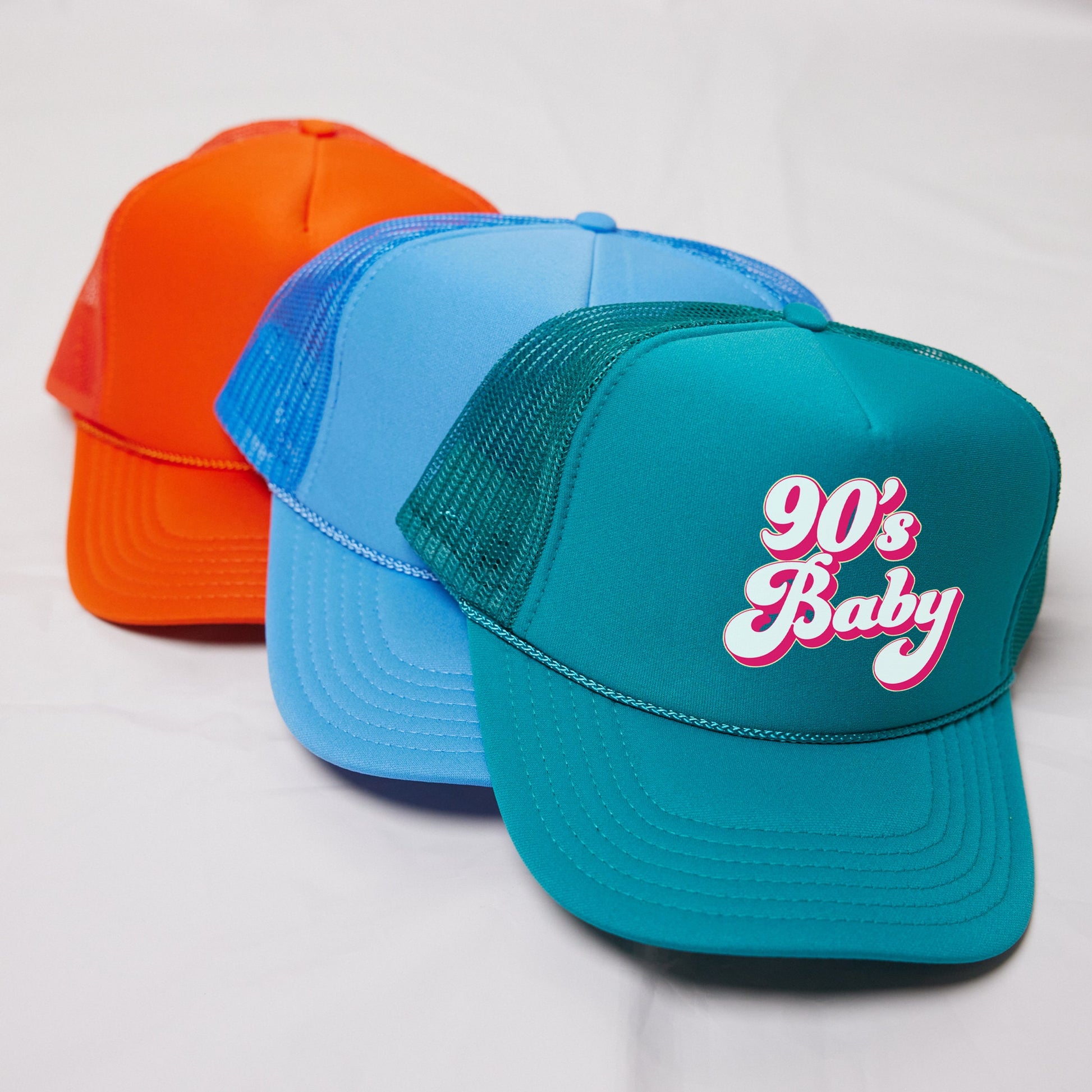 three hats with the words 90&#39;s baby on them
