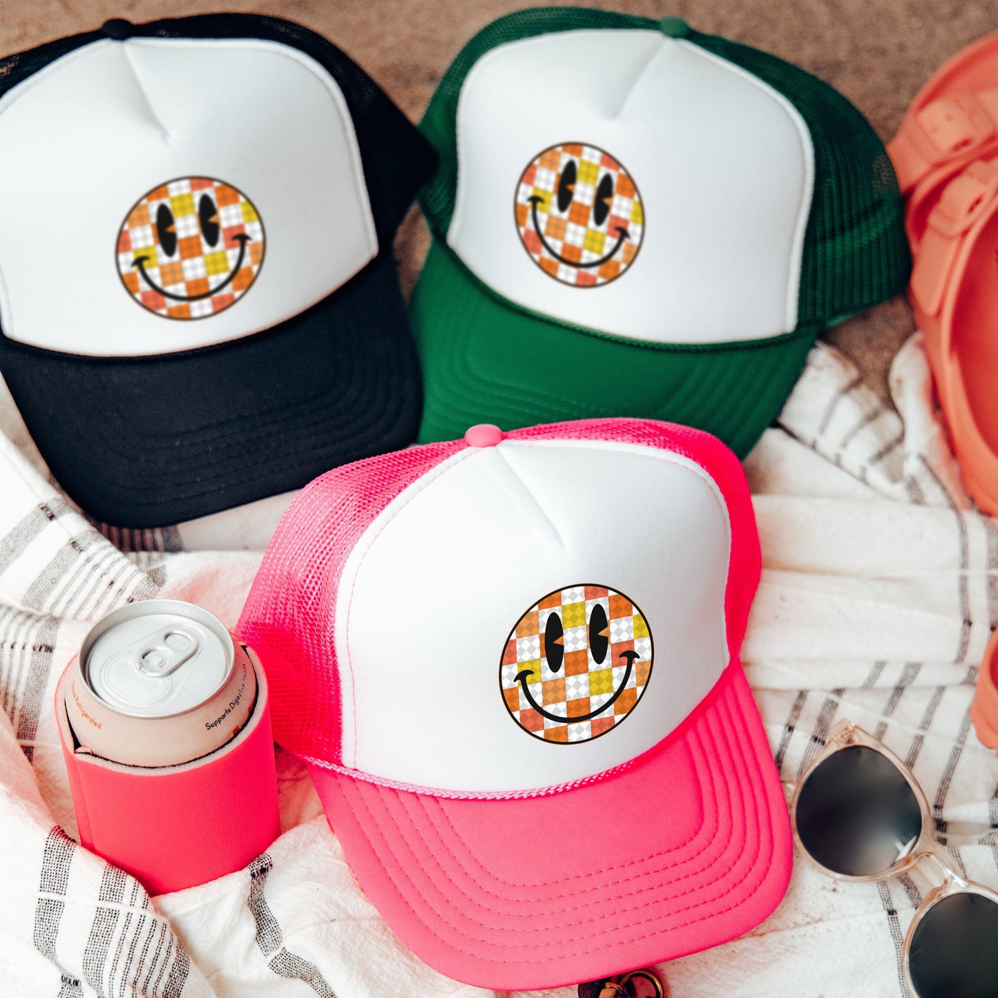 a group of hats sitting on top of a blanket