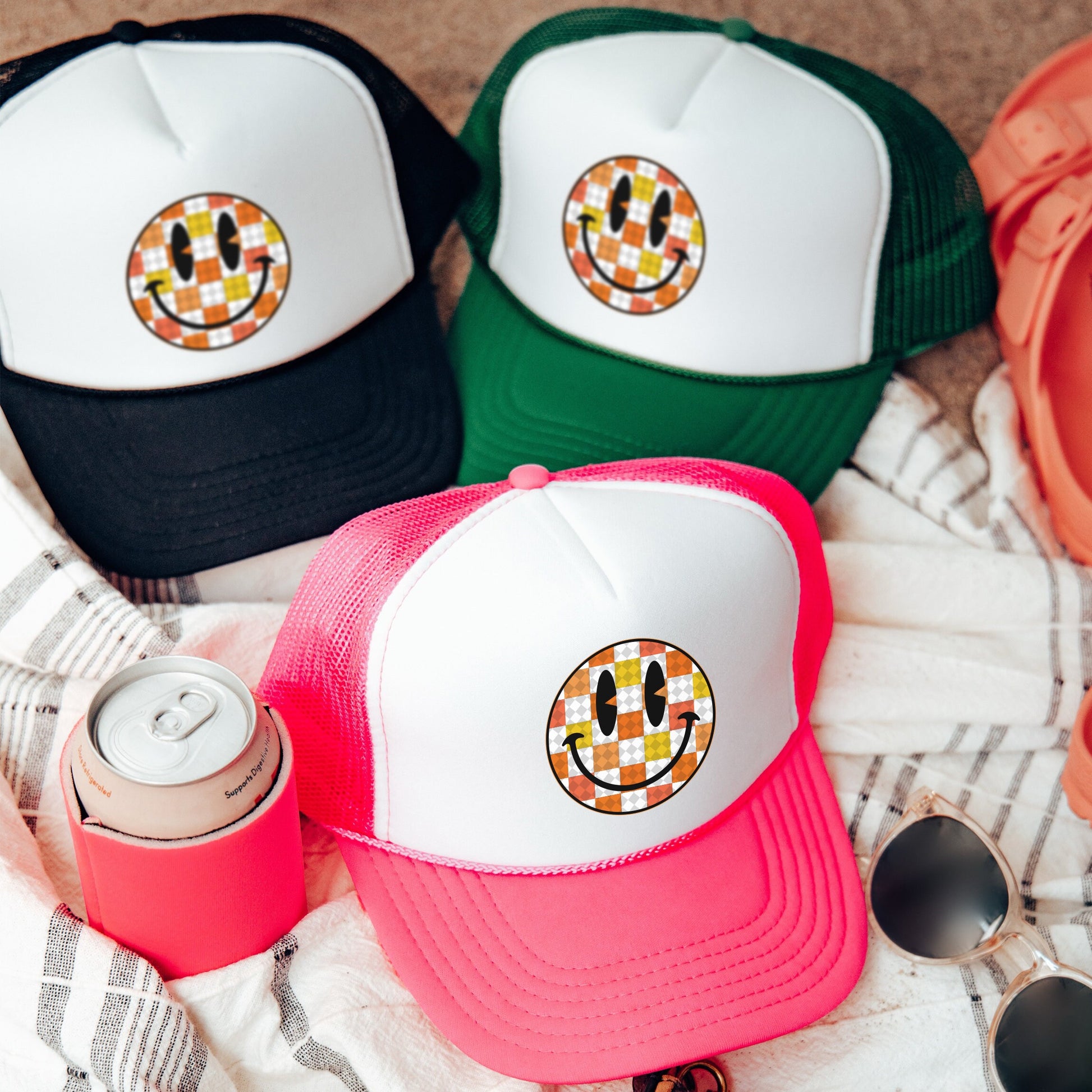a group of hats sitting on top of a blanket