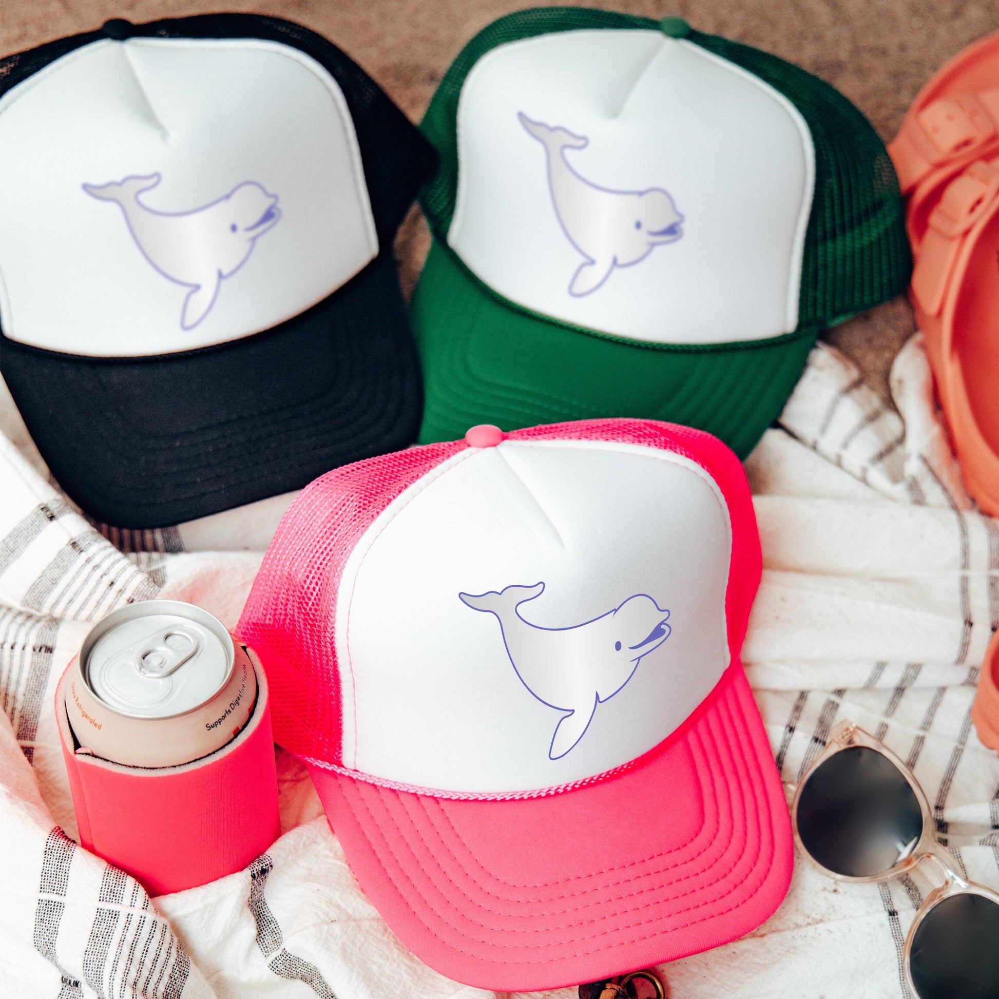 a group of hats sitting on top of a blanket
