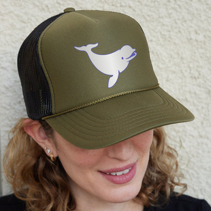 a woman wearing a trucker hat with a dolphin on it