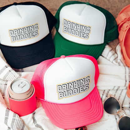 a group of hats sitting on top of a blanket