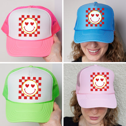 four different hats with a smiley face on them