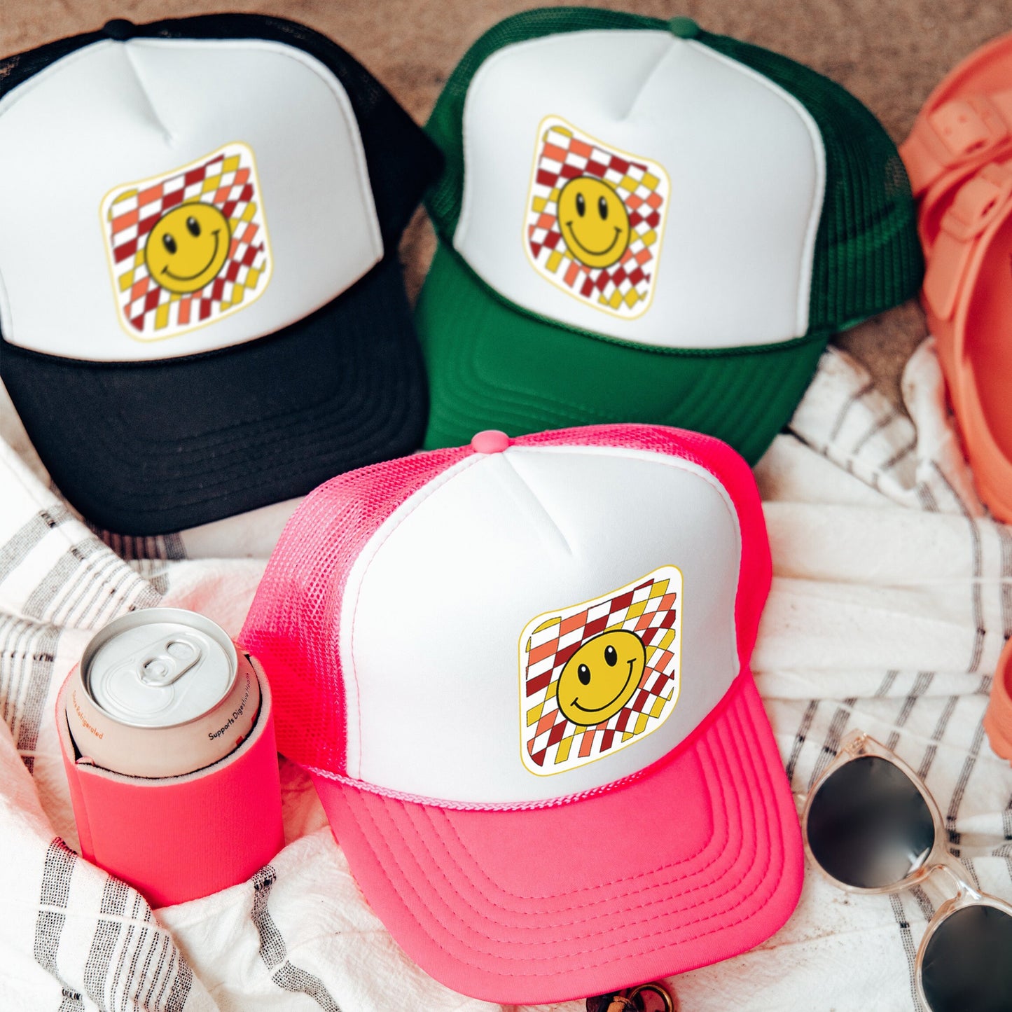 a group of hats sitting on top of a blanket