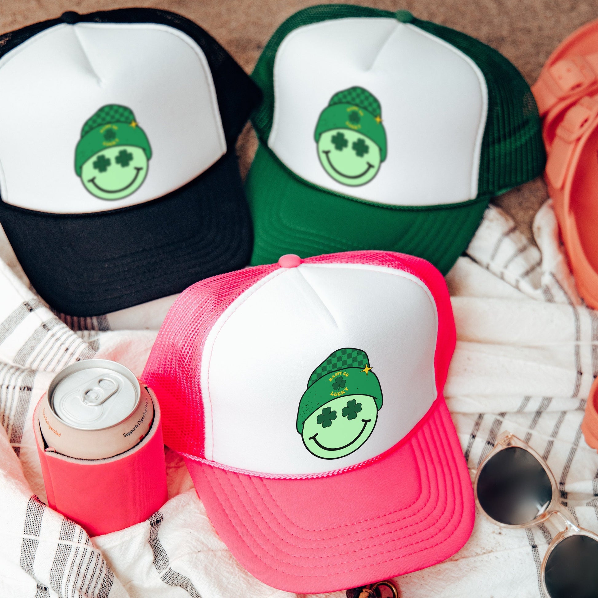 a group of hats sitting on top of a blanket