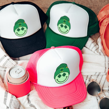 a group of hats sitting on top of a blanket