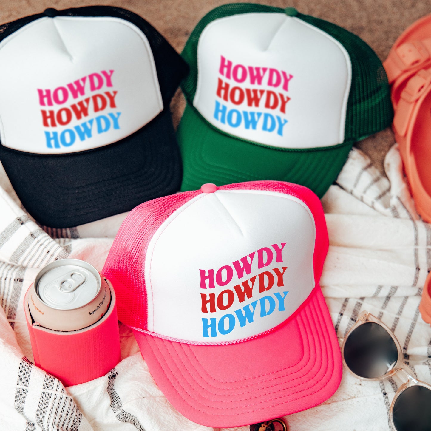 a group of hats sitting on top of a blanket